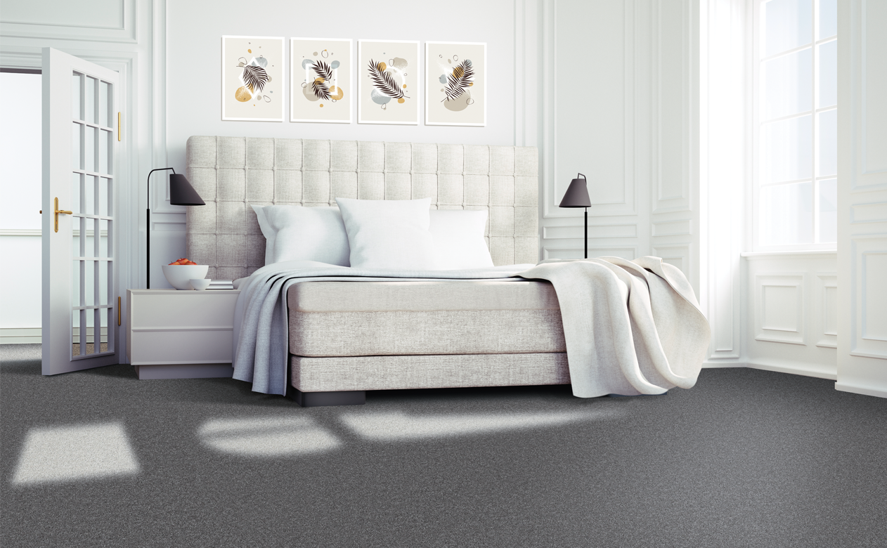 dark grey carpet with white plush headboard 