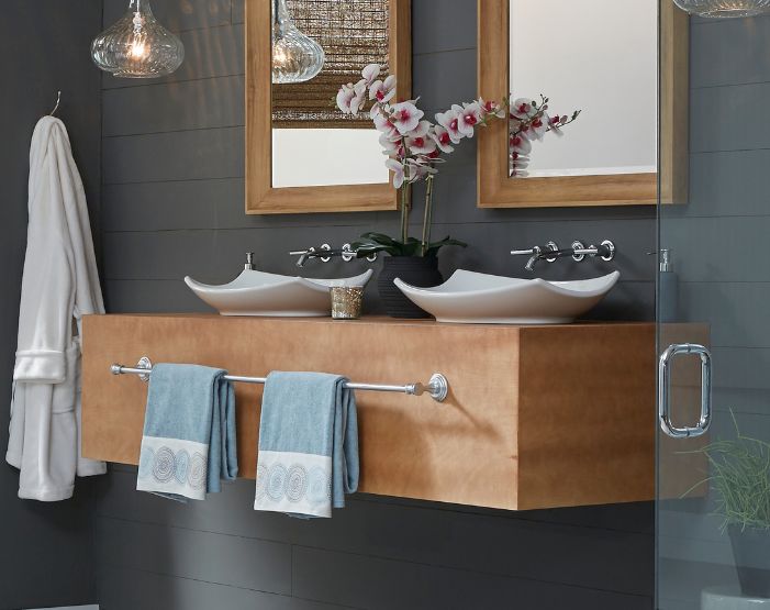 Sinks in a designer bathroom at Tudor Floors & More Kiba Studios