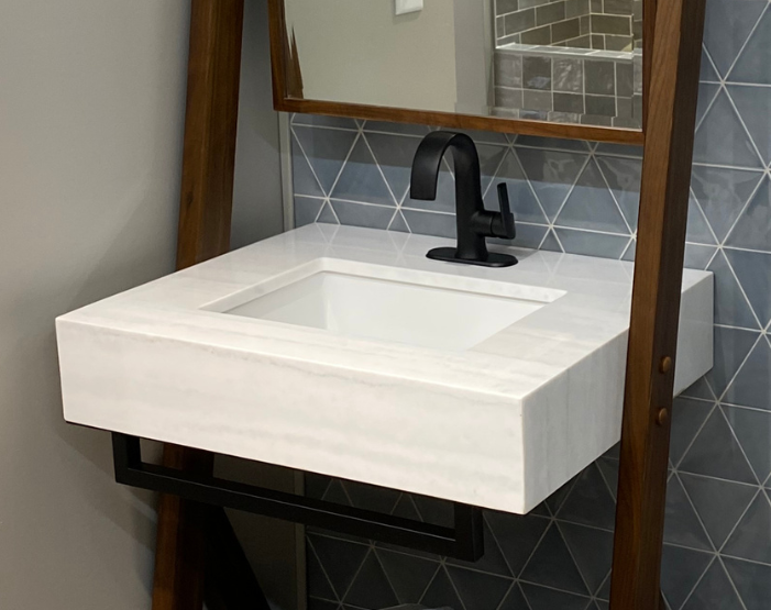 Sinks in a designer bathroom at Tudor Floors & More Kiba Studios